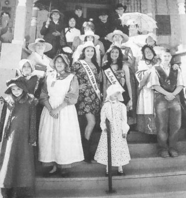 April 2009: PERIOD PROMENADE – All those who participated in the Period Promenade pose for a group shot on the steps of the Annie Riggs Memorial Museum.