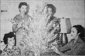 October 1959: PLANNNING GIFT SHOW – Members of the Fort Stockton Historical Society exhibit committee shown here are making plans for the Christmas gift show at Annie Riggs Museum by Walter Davis of Midland. To be held Nov. 7 and 8, the show will be open to the public. Around the Christmas tree are, from left, Mrs. Clayton Williams Jr., Mrs. Gene Riggs, Mrs. Frank. K. Baker and Mrs. D.J. Sibley Jr., chairman. Another committee member not present was Mrs. Jim Kerr.