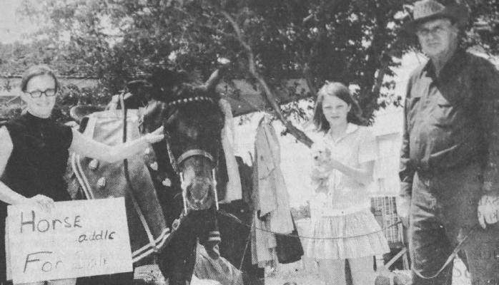 August 1971: HORSE FOR SALE –Most garage sales boast of unusual items for sale, but whoever heard of a horse at a garage sale It happened in Fort Stockton as the eight families participating in this sale at the Clyde Word home located at 1007 N. Missouri tried their best to sell an eight-yearold mare belonging to Lem Railsback. Pictured with the horse, from left, Mrs. Clayton Layman, Tammy Swinney and Clyde Word.