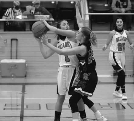 Iraan’s Madyson Gallegos puts pressure on a McCamey athlete during the Bravettes home matchup against the Badgers on Wednesday, Dec. 30. (Photo by Jessica Rodriguez)