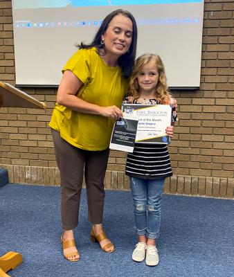FSISD Alamo Principal Linda Chavez presented Taylee Gregory with her Student of the Month award. Photos by Nathan Heuer