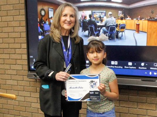 Michelle Ortiz is the Alamo Elementary Student of the Month for March. Ortiz received the award from Alamo Assistant Principal Cathy Havins.