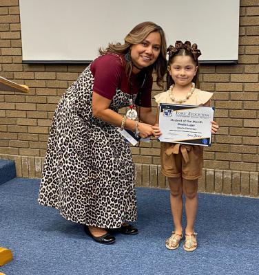 FSISD Apache Principal Karina Pacheco presented Giselle Lujan with her Student of the Month award.