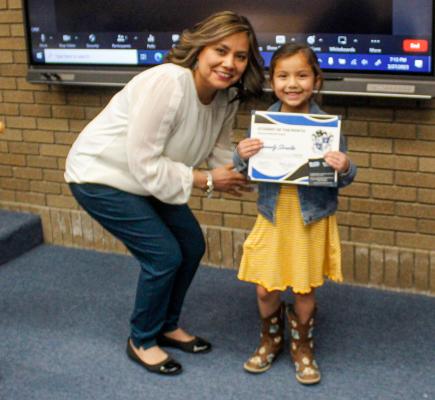 Presley Sorola was honored as the Apache Student of the Month at the district’s school board meeting on Monday. Presenting Sorola the award was Apache Principal Karina Pacheco.