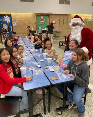 Students who met the perfect attendance criteria at the Fort Stockton ISD Intermediate School had cookies and cocoa with Santa and his elf on Dec. 15 before embarking on Christmas break.