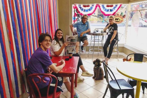 Maxi, Echo, Ricardo and Lynn relaxed at the Mesquite Tree coffee shop with their miniature poodle Atticus. The Californian family regarded downtown Fort Stockton as a standout of their visit. 