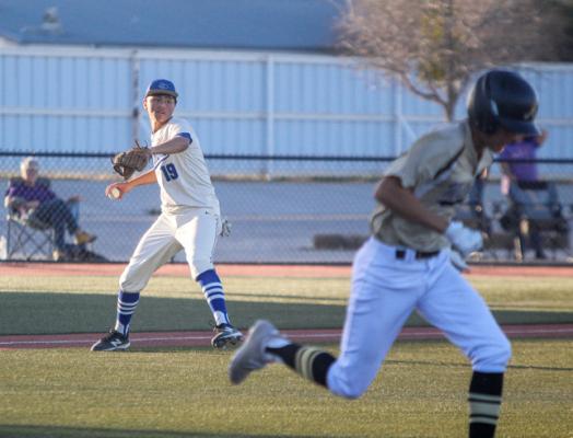 Fort Stockton's Alfredo Molina (19) lines up a throw from his third base position for an out on the Panthers homefield on March 25. Photo by Nathan Heuer