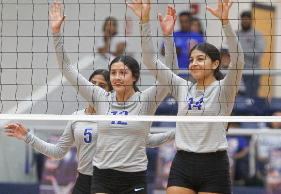 Mia Garica (12) and Amaya Urias (14) have become a formidable defensive duo in the front row for the Prowlers this season. In Fort Stockton first two district games, the duo have combined for 12 blocks, including a team-best seven from Urias. Photo by Nathan Heuer