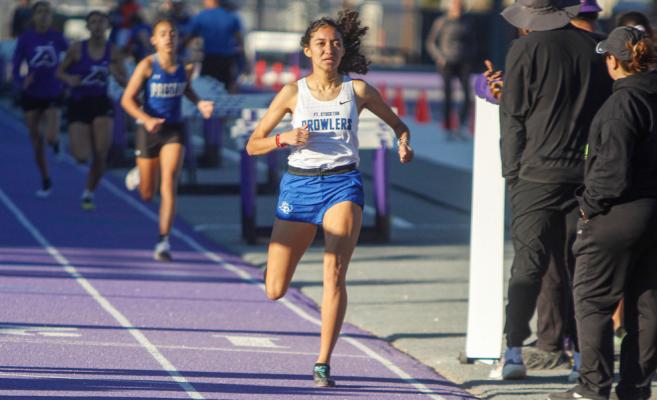 Ali Jackson completes the 800-meter run in first place at the West of the Pecos Relays on March 3. Photo by Nathan Heuer