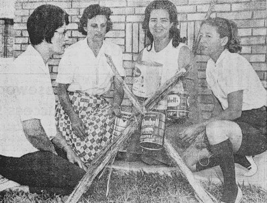 MAY 1965-GIRL SCOUTS DAY CAMP- Pictured left to right are Mmes. Red Wood, Leslie Price, Bill Kail, and Bob Thacker, Girl Scout leaders, who have been making plans for the summer day camp to be held at Fossil Mesa. Shown in the center is a utility tree which is made by lashing cedar stakes together. (Staff Photo)