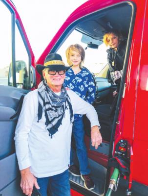 Steve Oliver fueled up at the local Chevron with his grandsons Rory and Elliott on Sunday. The trio was excited about the rest of their road-trip, which continued on from West Texas to Colorado. Photo by Jeremy Gonzalez