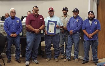 Director of Public Works Luis Guerra accepts recognition from the City of Fort Stockton on behalf of all the hard workers behind the scenes.