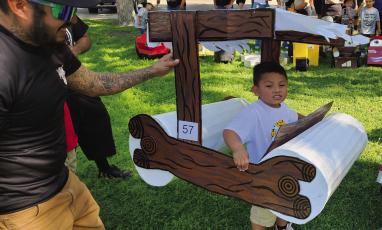 Fred Flintstone theme box car was on hand to celebrate Head Start’s friendly competition last Friday. Photo by Kerry Waldrip