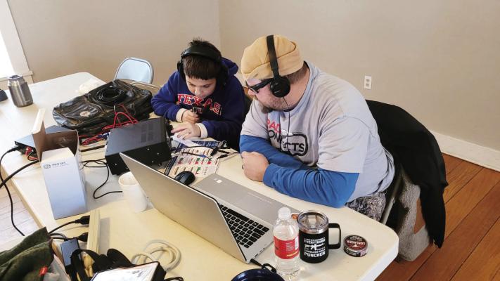 Here Thomas Kincade and his Uncle James Kincaid are making voice contacts. Thomas is the youngest member of our club, and the youngest ham in Pecos County. Courtesy Photo
