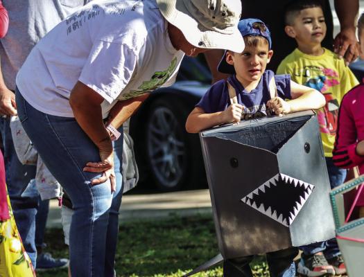Young racers competed in the Head Start Car Show and Parade, Friday morning at Zero Stone Park. The parade began at the Pecos County Community Action Agency Head Start on James Street, proceeded to Zero Stone Park and, after awards, went back to the Head Start building. The parade and car show helped celebrate the importance of male involvement in a child’s life. Photo by Shawn Yorks