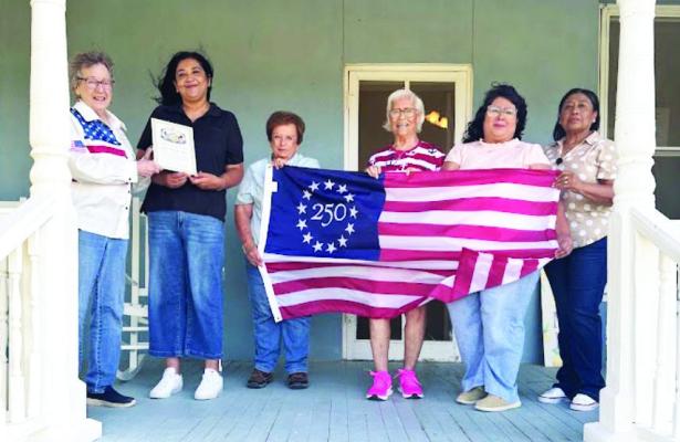 On Monday, the Lilah Smith Safe House was presented by the Pecos County Historical Commission with a prestigious “250th” Anniversary Flag to honor its enduring commitment to survivors of domestic and sexual violence. Photo by Kendra Reed
