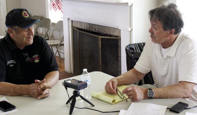 Tai Kreidler, right, interviews Paul Pasque, during the oral recording session for the Texas Tech Southwest Collections archive. Photo by Joh Covington