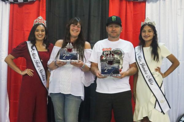 2022 Miss Fort Stockton Ysabella Sanchez (left) presents second place in the 100-mph class to driver Lee Miller Fort Stockton and navigator Layla Dunnam at the 2022 Big Bend Open Road Race 2.0 banquet on Oct. 15, along with Junior Miss Fort Stockton Ariana Ramirez (right). The Miller-Dunnam duo pushed their 2016 Challenger with an average speed of 100.006 mph. Pioneer photo by Shawn Yorks