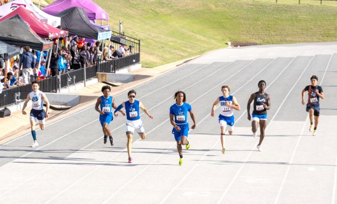 Fort Stockton senior Eduardo Hernandez crosses the finish line during the boys 200-meter finals at the UIL Region 1-4A Track and Field Championships at Lowrey Field in Lubbock. Hernandez placed second with a time of 21.52 to qualify for the UIL State Track and Field Meet in Austin. Pioneer Photo by Tristian Barragan