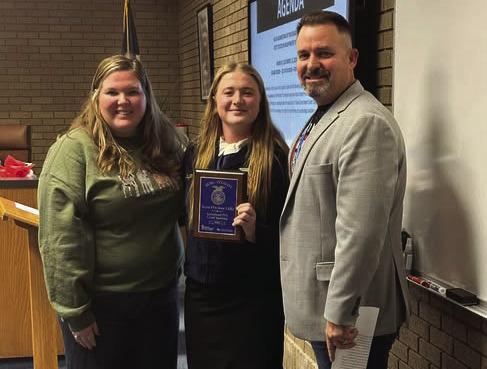 The Superintendent and cabinet members recognized Meagan Hanson as a FFA state qualifier at the December 16 school board meeting. Courtesy Photo
