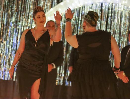 Models from Studio Number One strut their stuff on the runway.
