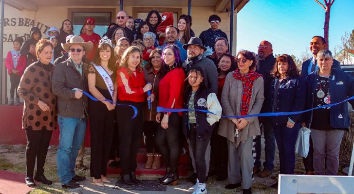 The crew at Sisters Beauty Salon was joined by family and friends, as well as Miss Fort Stockton Ysabella Sanchez, for a ribbon cutting ceremony and 60th anniversary celebration on Dec. 22 at the salon, located at 204 S. Young St. The salon has been passed down through generations for 60 years and recently joined the Fort Stockton Chamber of Commerce. Photo by Shawn Yorks