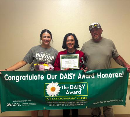 Jacinda Wiest, RN pictured center, was awarded Daisy Award through nominations from patients and coworkers. Photo courtesy of Malissa Trevino