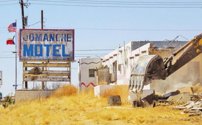 The long-standing Comanche Motel at the far east end of Dickinson was torn down by new ownership this week. The property was most recognized for its Indian-themed paint job and was shortly listed as a substandard property. Photo by Jeremy Gonzalez