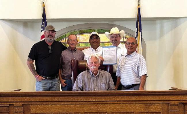 Pecos County Commissioners signed a resolution, expressing concern regarding the proposed construction of a physical border wall in the Big Bend region. Pictured from left (back) Precinct 4 Commissioner Nathan Reeves, Precinct 3 Commissioner Mickey Jack Perry, Precinct 1 Commissioner Francisco Ramirez, Pecos County Sherrif Thomas J. Perkins, Precinct 2 Commissioner Jerome Chavez and County Judge Joe Shuster. Pioneer Photo