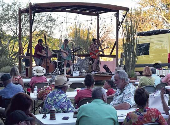 Musical artist Kimmi Bitter serenaded a crowd last Thursday during the “Summer off the Patio” concert hosted at the Annie Rigg’s Memorial Museum. Photo by Ross Harper