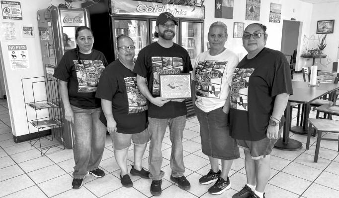 Pictured here are Mingo’s Burritos owners Domingo and Maria Perez and Chela Garcia, Flor Galindo, Daniel Casillas, Irma Mireles, and Susana Balvantin. Courtesy Photos