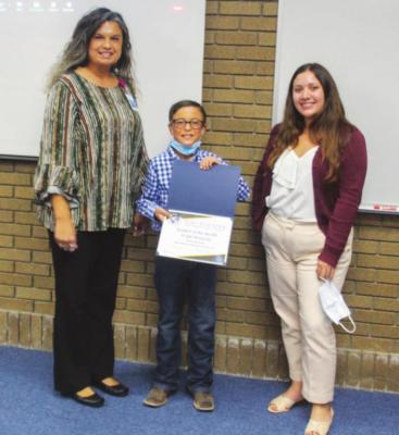 Intermediate Student of the Month Angel Marquez with principal Amanda Urias.