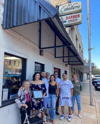 Caballero’s Barber Shop, located on Main Street in Fort Stockton, was one of five businesses recognized by the Pecos County Historical Commission with a certificate of recognition as a part of Barrio Fest this past weekend. The barber shop, along with the additional four businesses, received the recognition for operating in the city for over 50 years. Rebecca Ureta is the owner and operated by Andy Lopez. The business is now called Main Street Fades. Each certificate read, “Thank you for being a historic bu