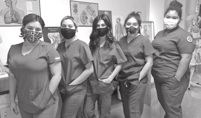 Fort Stockton High School students Shelby Murphy, Viviana Gonzalez, Kendra Estrada, Elyss Valenzuela, Kianna Payne received their Cardio Pulmonary Resuscitation (CPR) certificate through their pharmacy tech class at Midland College WRTTC on Monday, Dec. 14. (Contributed Photo)