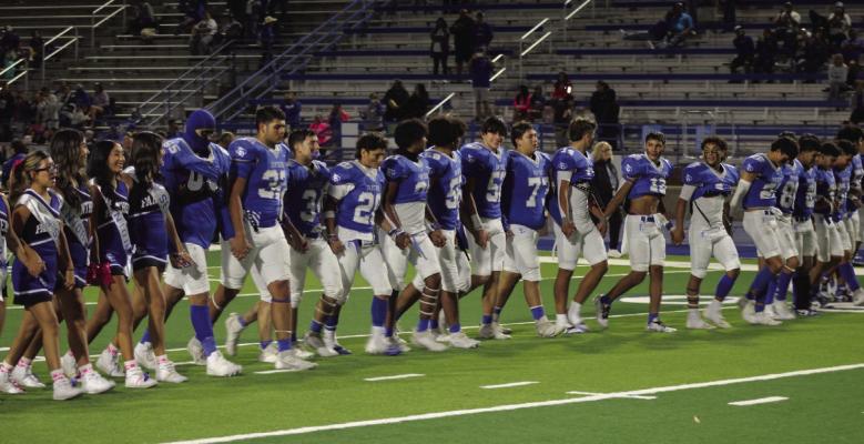 The Fort Stockton Panthers cross the field together after a recent game. They will face their next opponent this weekend, story on 8. Courtesy Photo