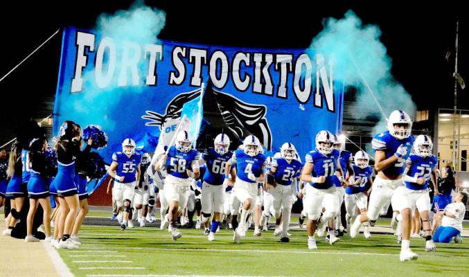 The Panthers charge onto the field at the Mustang Bowl, bringing playoff energy to Andrews ahead of their bi-district matchup against Lubbock Estacado. Photo by Nacho Ramirez, Tumbleweed+