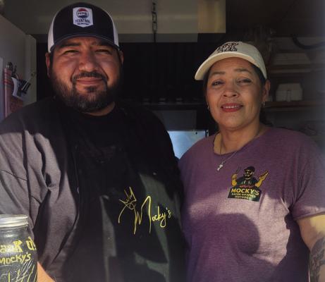 Raul and Laura Duarte, owners of Mocky’s Hotdogs, shared their story of growing as a small business in a fast year of changes. Photo by Joh Covington