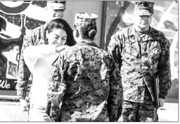 April Torres, right, is congratulated after receiving a plaque during her promotion ceremony Jan. 4 in Fort Stockton. The 2017 Fort Stockton High School graduate was promoted to Staff Sergeant. SSGT Torres works in the Midland-Odessa Marine Recruitment office.