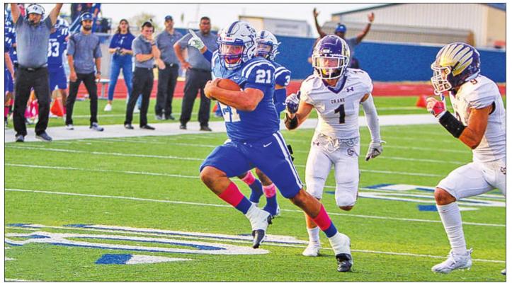 Fort Stockton’s Dominic Aguilar (21) trots his way to the endzone for one of his three rushing scores on Oct. 1, 2021 at home. Photos by Nathan Heuer
