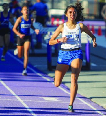 Ali Jackson completes the 800-meter run in first place at the West of the Pecos Relays on March 3. Photo by Nathan Heuer