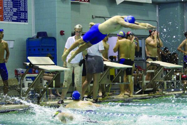 Competing against tough teams from across the region, the Blue Wave swimmers showed their determination, achieving significant time drops and earning top finishes in multiple events. Story on Page 8. Photo courtesy of Coach Forst
