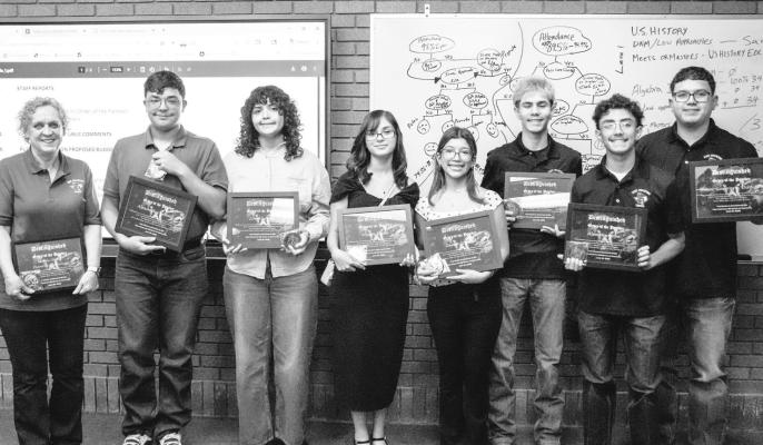 New “Order of the Panther” inductees — Pictured here, left to right, is Beverly Olsen, students Alexander Gomez, Zoe Alvarez, Alyssa Ryan, Zeyda Ureste, Corado Palacios, Alex Montoya, and Director Omar Guerrere. Photo by Tristian Barragan