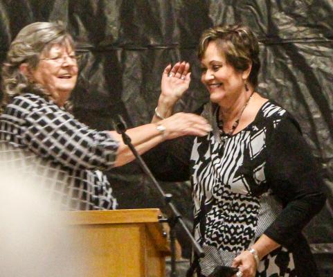 Letricia Slater, right, was presented the Leadership Alumni Award by the Fort Stockton Chamber of Commerce and Executive Vice President Arna McCorkle, who has been with the chamber over 19 years.