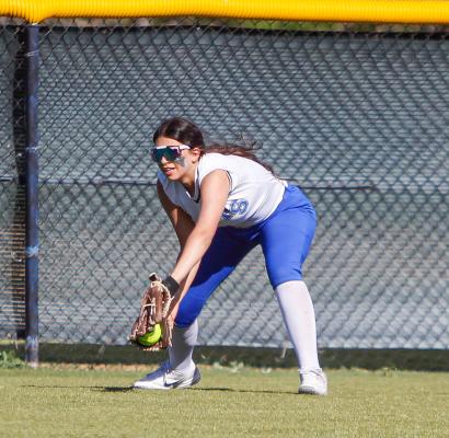 Senior Arial Smith narrowly snags a fly ball for an out during the early stages of Tuesday’s contest versus Monahans in Fort Stockton. Smith had a perfect 1.00 fielding percentage in the contest. Photo by Nathan Heuer
