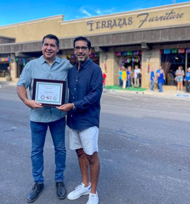Terrazas Furniture, located on Main Street, was awarded with a certificate of recognition from the Pecos County Historical Commission as a part of Barrio Fest festivities this past weekend. Pictured are owners Mario and Joey Terrazas.