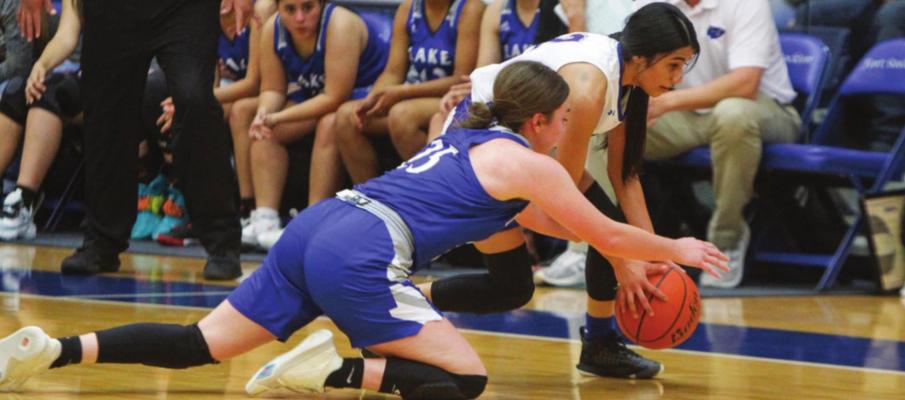 Fort Stockton junior Kianna Torres (2) secures a steal during the Prowlers win against Lake View on Dec. 14. Photos by Nathan Heuer