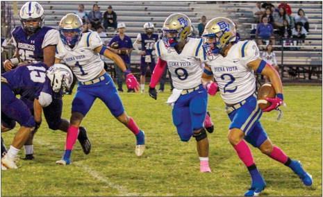 Jaden Jurado (2) carries the ball for Buena Vista last week against Meadow. The Longhorns took down the Broncos 62-6. Courtesy photo by Staci Schoenfeldt