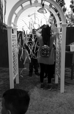 A ribbon for a memory — A Fort Stockton local ties a ribbon to the Memorial Arch in Fort Stockton last year. Courtesy Photo