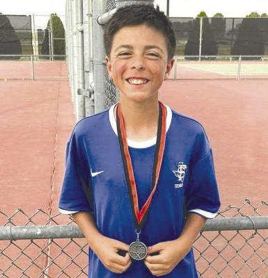 Angel Marquez 7th Grade 2nd in Boys Singles.