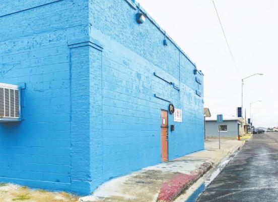 Owners of the Ocean King game room at 305 N. Main St have slapped a fresh coat of aqua blue paint on the building after facing another city-ordered closure. The business deemed out of compliance is making desperate attempts to abide to the city ordinances and be approved by the city Building Official, after over ten-days of being closed. Photo by Jeremy Gonzalez